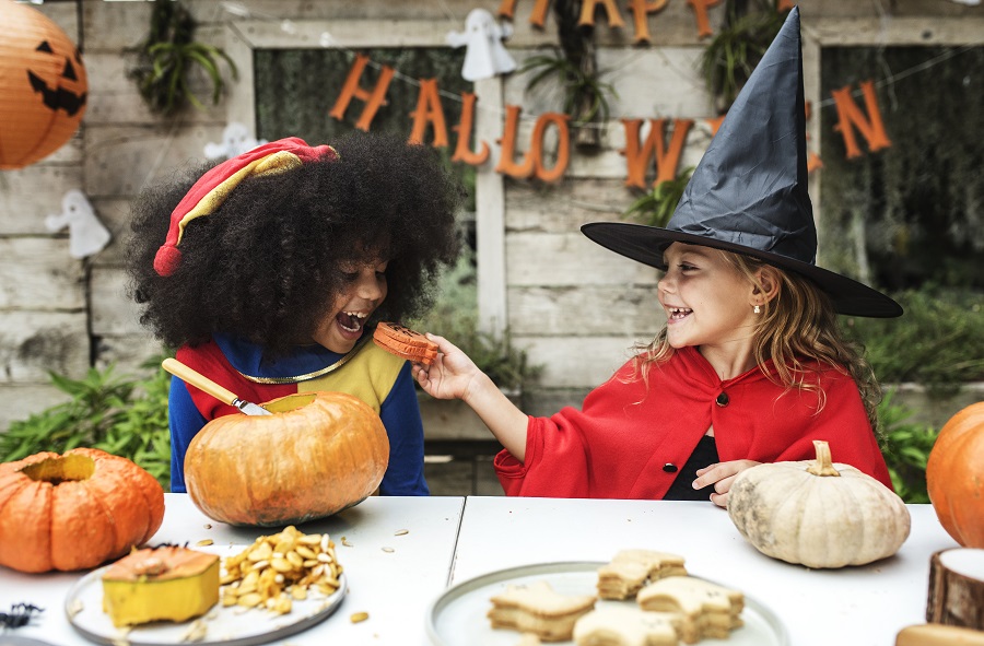 Kids in costume enjoying the Halloween season